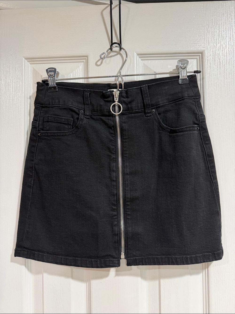 Sneak Peek Black Front-Zip Mini Skirt with Ring Pull